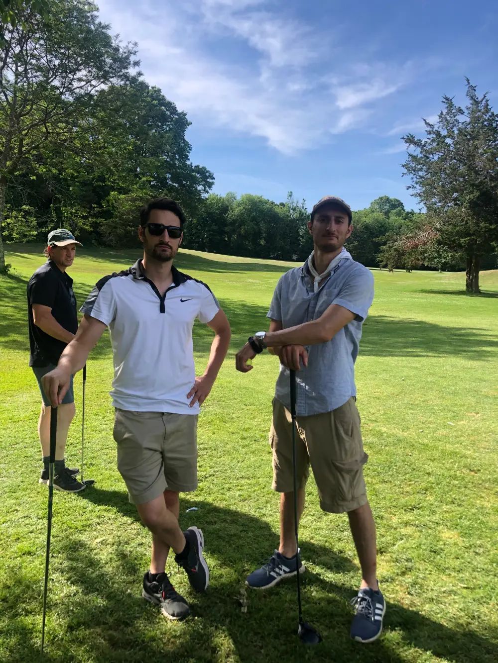 Clark Land Surveying team on a golf course during a GIS mapping project